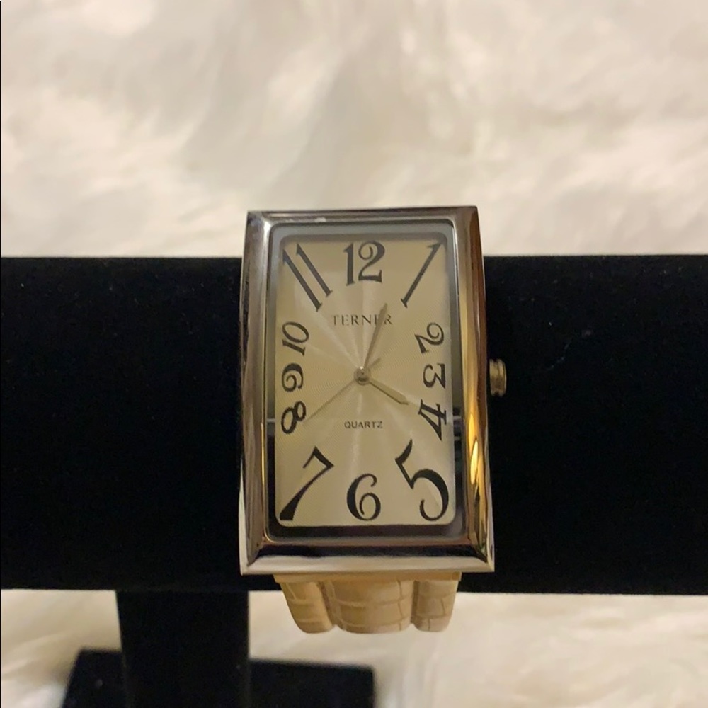 Bijoux Terner silver water with Tan Strap